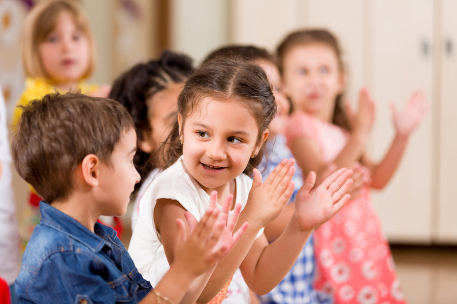 Preschoolers playing in classroom.